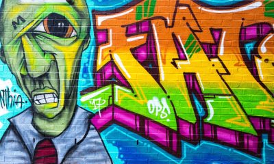 Con graffitis, ONG visibilizan a personas en situación de calle