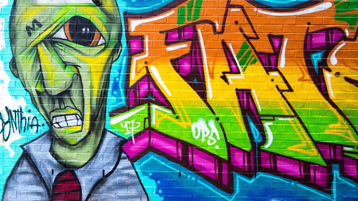 Con graffitis, ONG visibilizan a personas en situación de calle