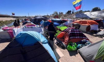 Más de dos mil migrantes venezolanos acampan a orillas del río Bravo
